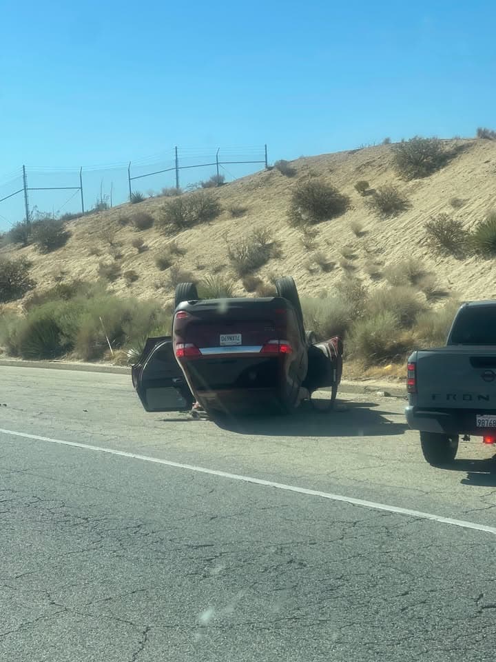 902T/902R....Avenue S East of 14 Fwy....two vehicle collsion, maroon Jeep overturned on...