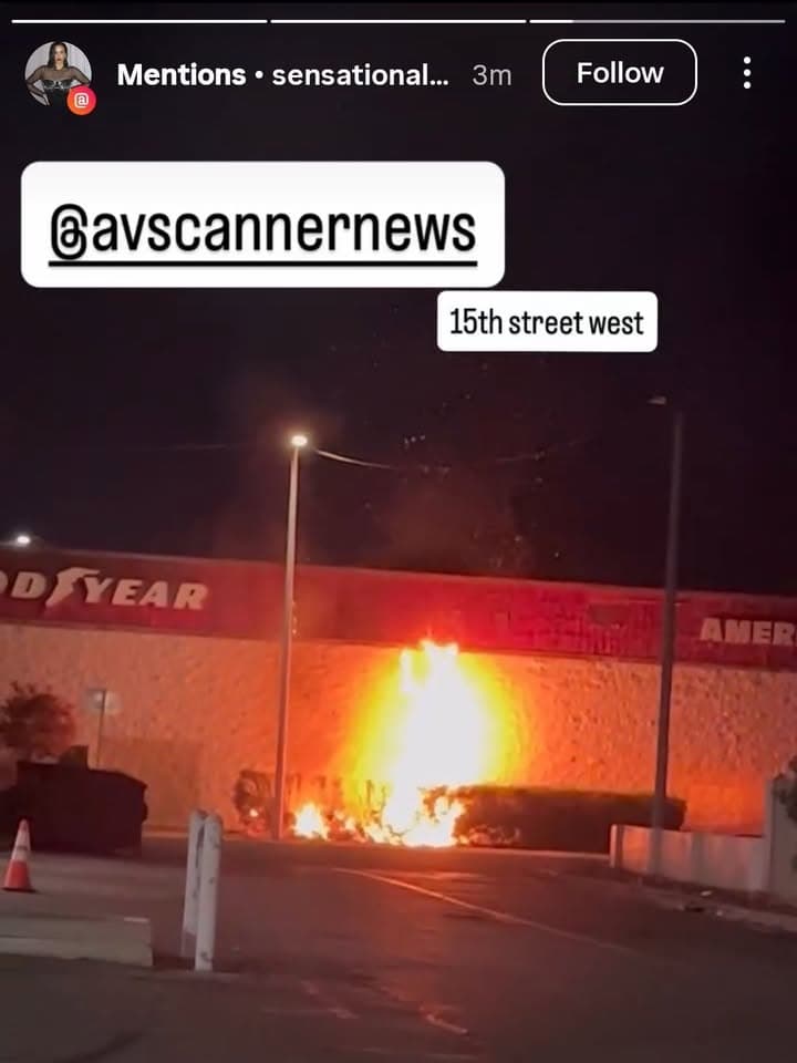 904B....15th Street West and Avenue K....bushes on fire behind tire store on...