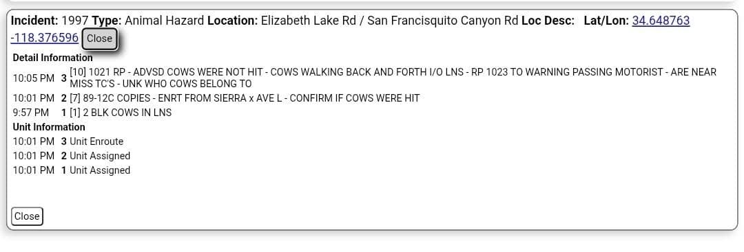 11-25....Elizabeth Lake Road and San Francisquito Canyon Road....two cows walking in lanes,...
