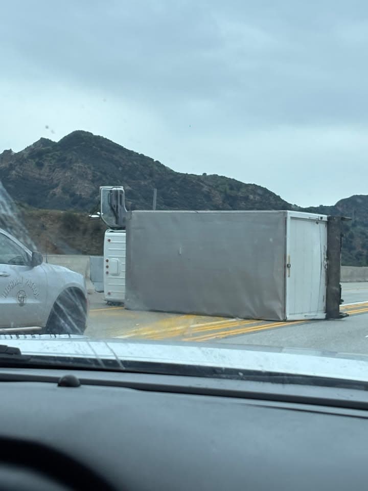 11-79....Southbound 14 and Placerita Canyon....box truck rolled over in HOV lane, tow...