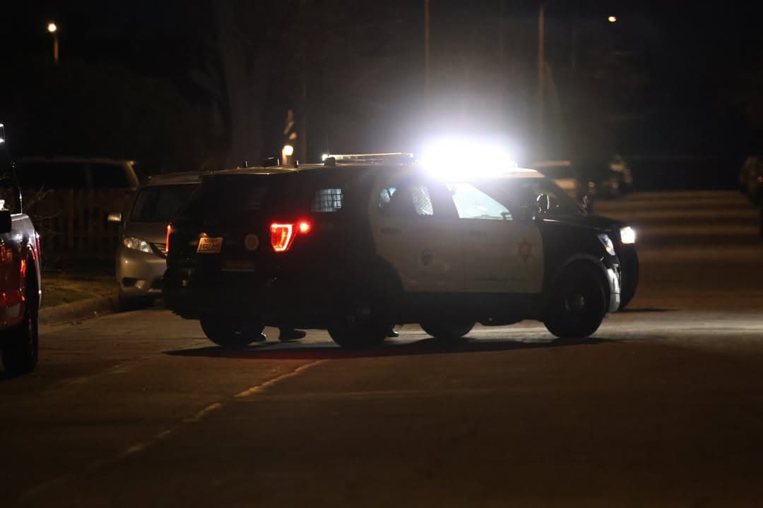 927S....2nd Street East and Avenue P-16....male being held down by another male,...