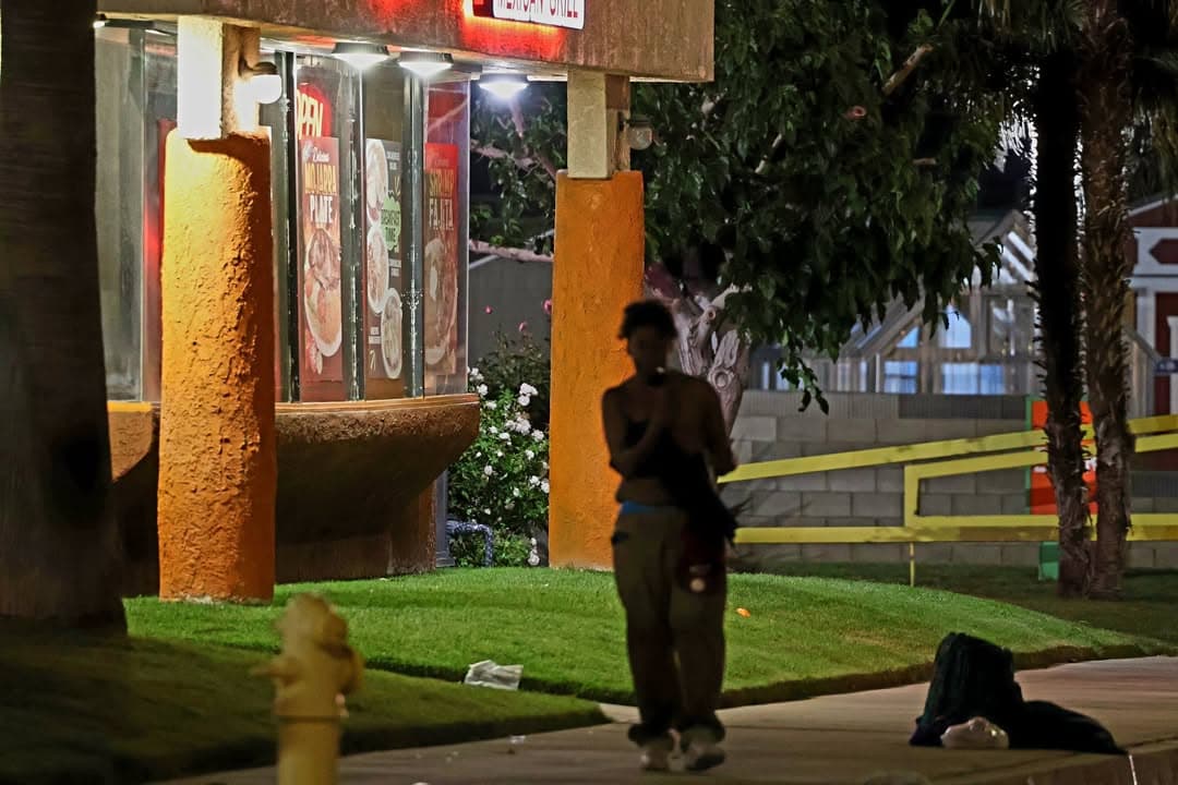 314....Sierra Highway and Avenue K at Mi Ranchito....female black adult inside restaurant...