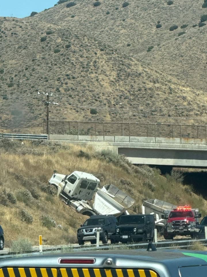 11-79....Southbound 14 at Red Rover....semi truck vs silver sedan on right shoulder....CHP...