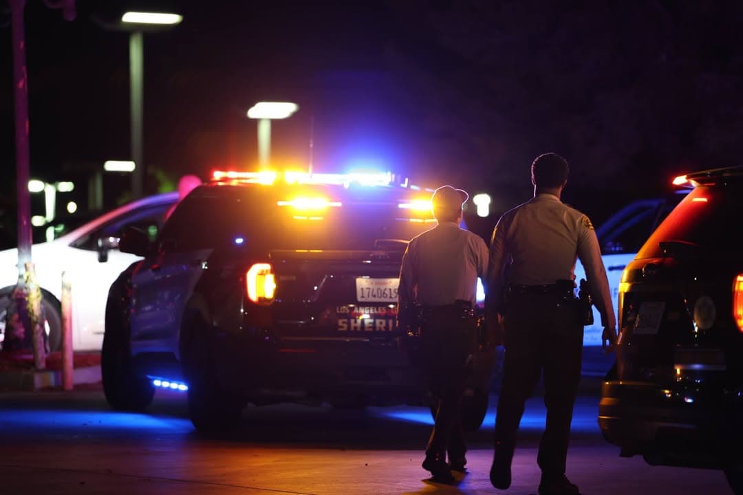 Deputies detaining to burglary suspects at gunpoint on 10th Street West and Avenue K-4 at Avis/Budget parking lot