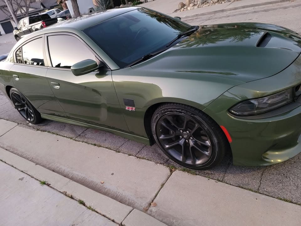 Car was stolen last night. Green scat pack charger license plate #8WAX26. Area of Avenue L and 30th Street West